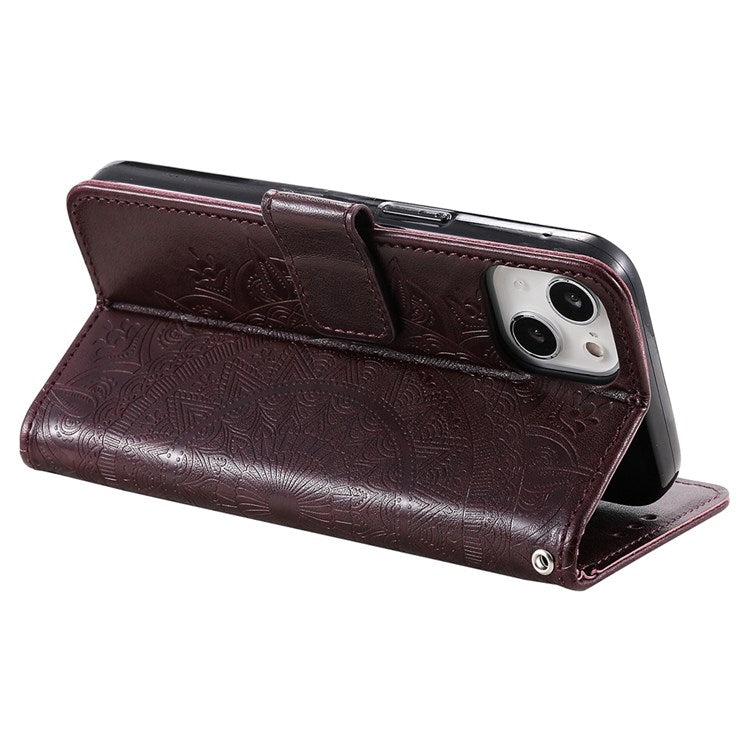 For iPhone 14 Plus 6.7 inch Wallet Case Imprinted Mandala Flower Pattern PU Leather Wrist Strap Stand Feature Flip Cover - Brown