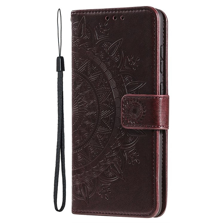 For iPhone 14 Plus 6.7 inch Wallet Case Imprinted Mandala Flower Pattern PU Leather Wrist Strap Stand Feature Flip Cover - Brown