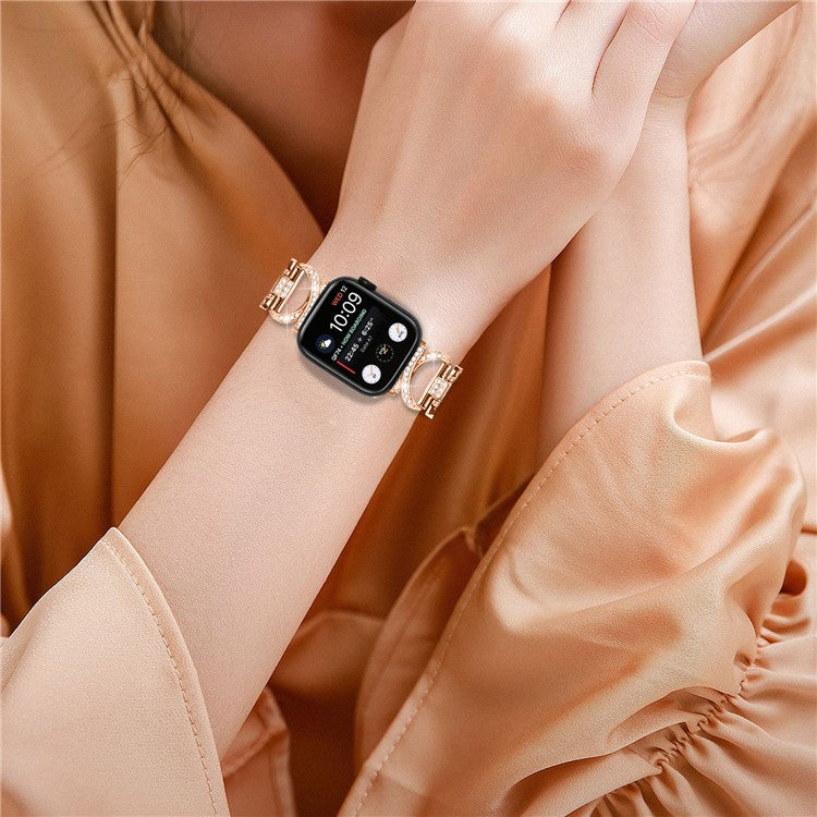 Watch Band for Apple Watch Series 10 46mm / Ultra 2 Ultra 49mm /  Series 9 8 7 45mm / 6 5 4 SE (2023) SE (2022) SE 44mm / 3 2 1 42mm Rhinestones Decor Alloy Strap - Rose Gold