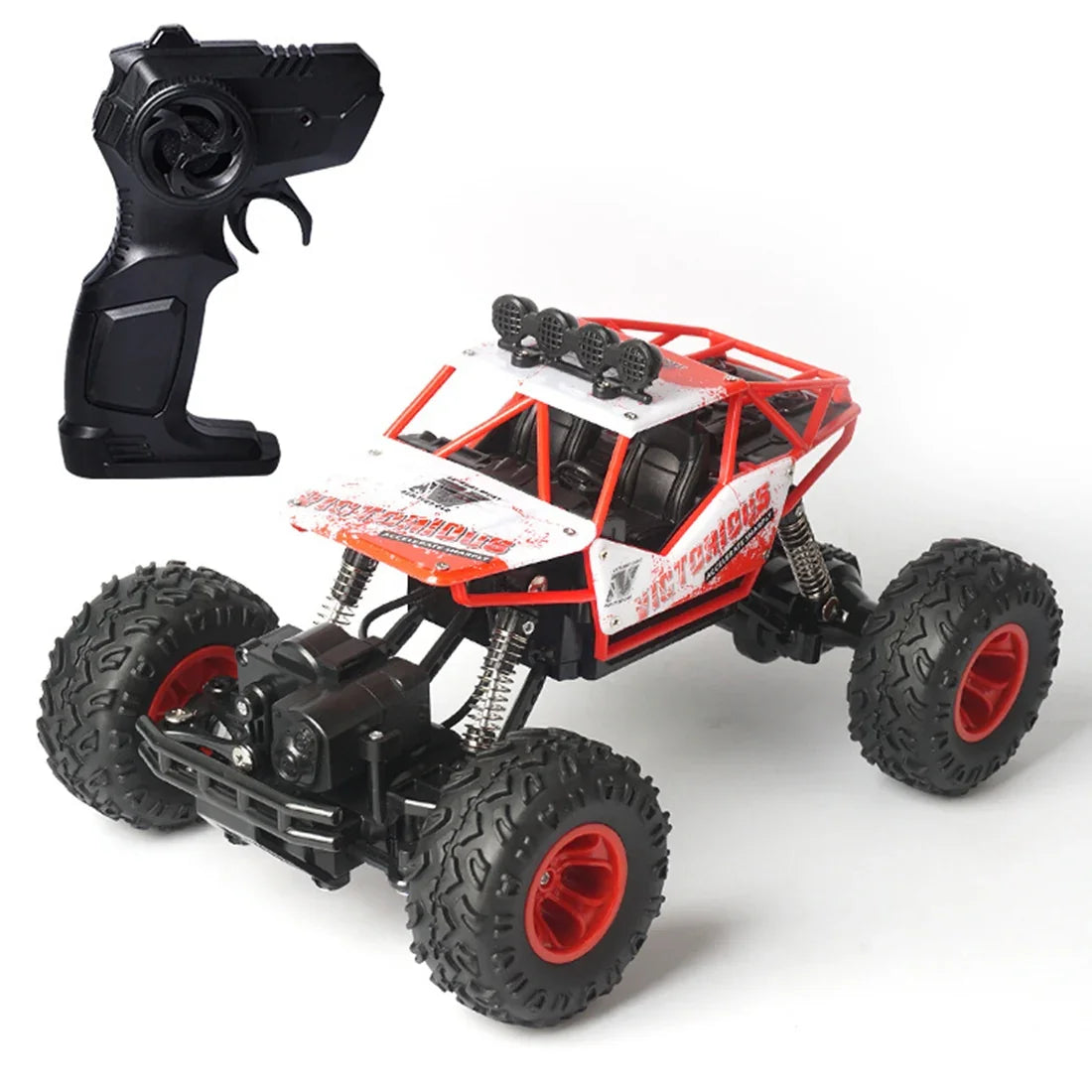Red and white remote control off-road car with black controller, large rugged tires